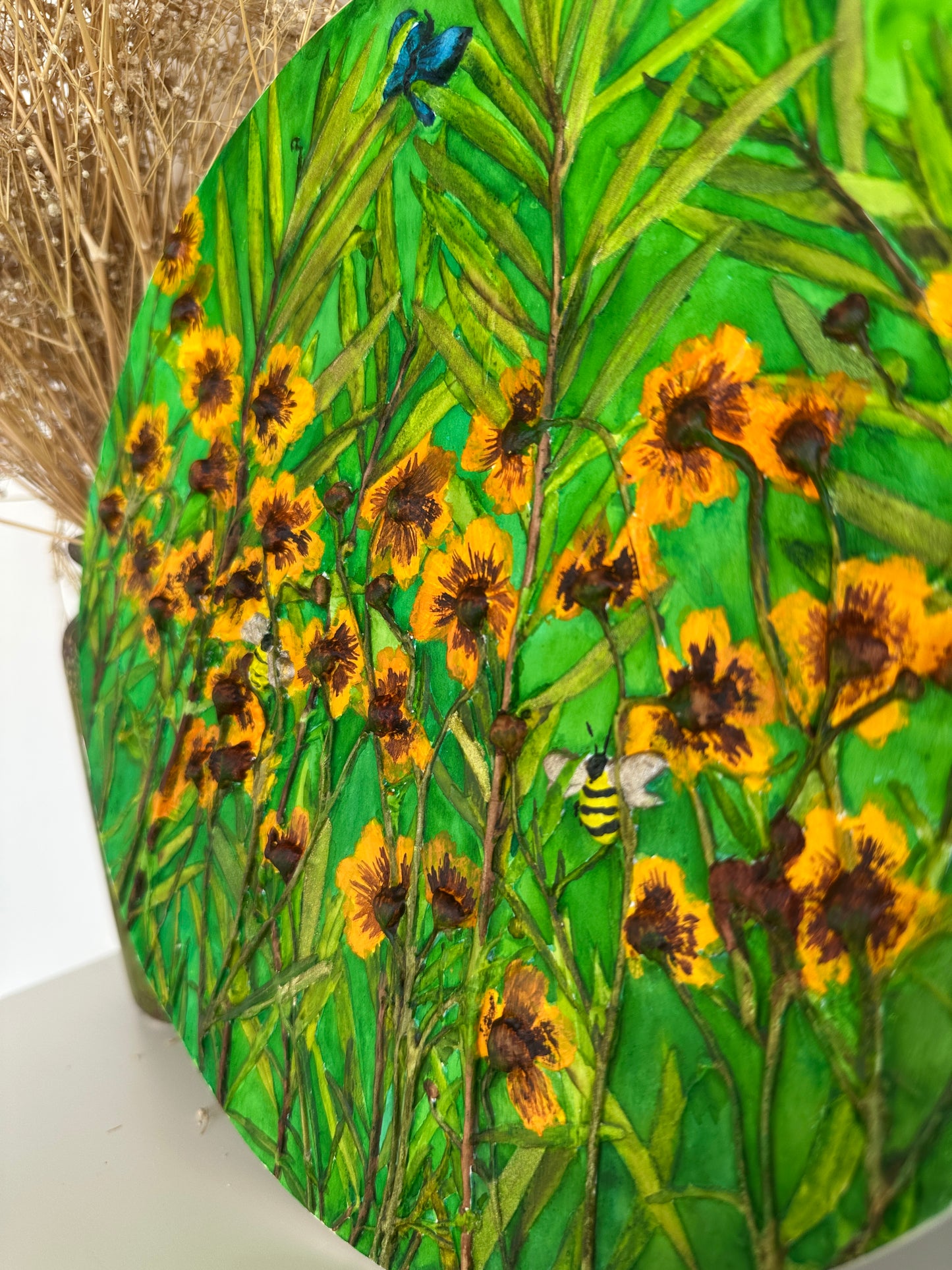 Close-up of botanical casting with vibrant blooms and fairy shimmer