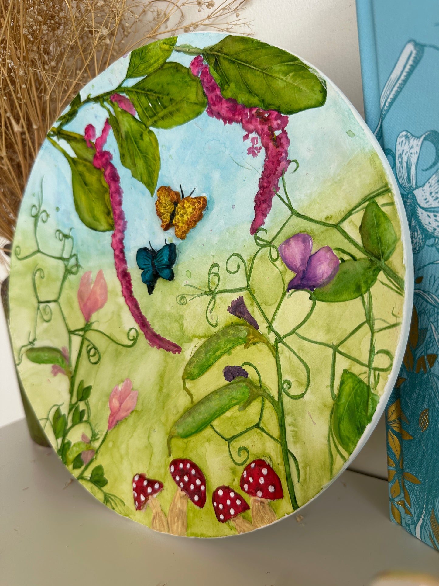Side angle showing textures and details of the floral plaster art