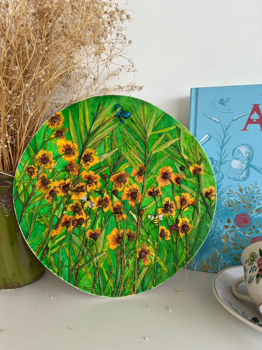 Tulgey Bloom tablet with yellow flowers and lush green leaves, hand-painted on plaster